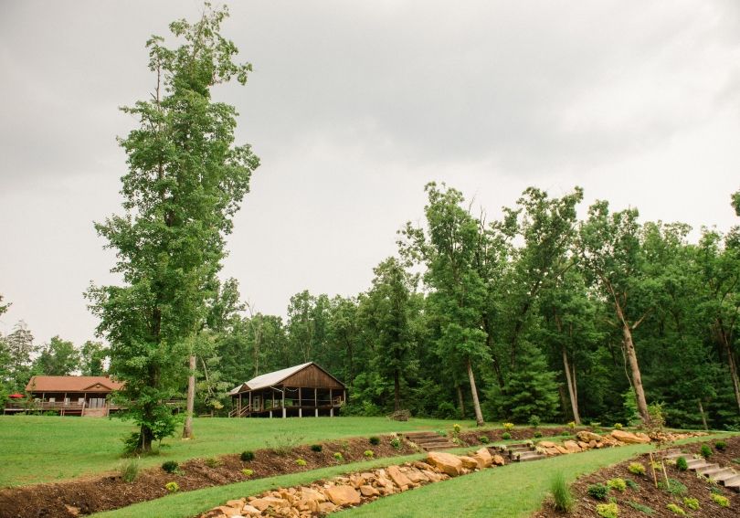 Cabins and the open-air pavilion on the green