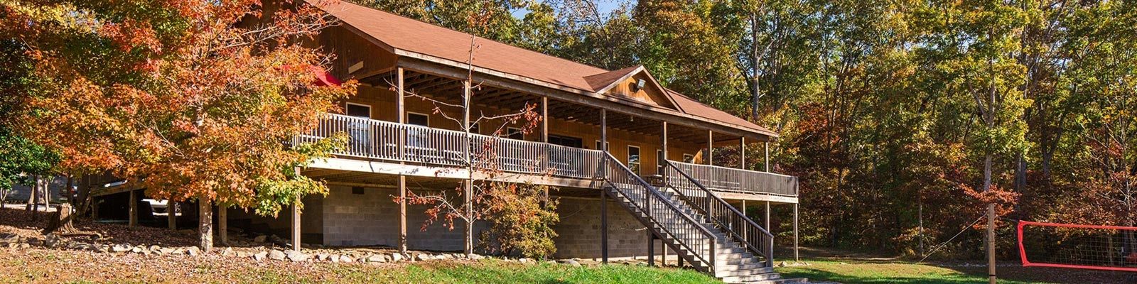 A lodge cabin at Lake Frances in autumn colors