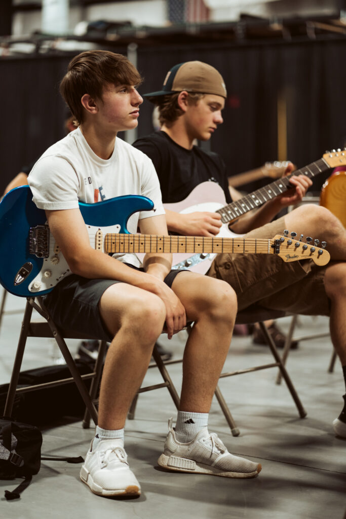 Campers playing together in a small class