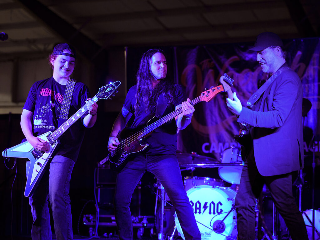 Woodshed attendee jamming with Ben and Andy